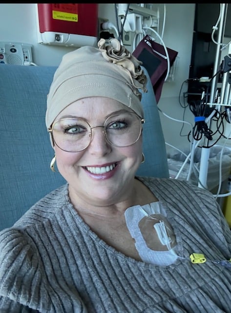 Dana Fischer in infusion chair-selfie