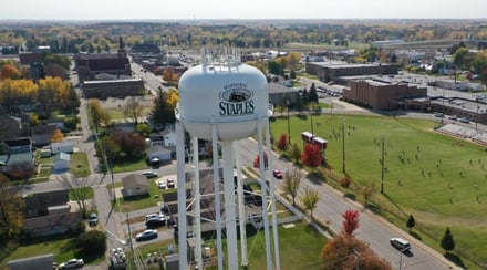 aerial-view-of-historic-staples-minnesota-water-tower-and-small-town
