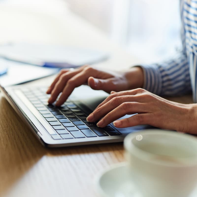 hands-typing-on-laptop