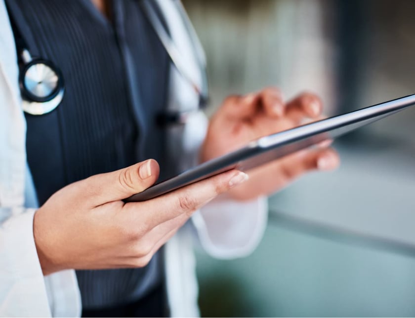 provider_hands_on_tablet_close_up